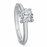 Low Profile Round Solitaire Engagement Ring with Diamond Prongs