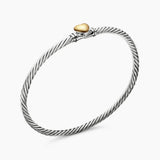 Sterling Silver Cable bracelet with a yellow gold heart in the center 