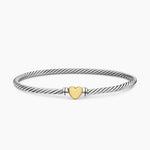 Sterling Silver Cable bracelet with a yellow gold heart in the center 