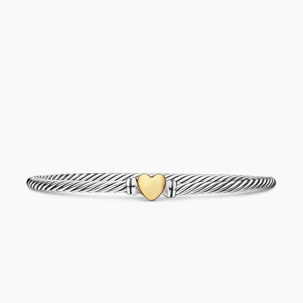 Sterling Silver Cable bracelet with a yellow gold heart in the center 