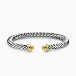 Sterling silver Cable Bracelet with 14-karat yellow gold 14-karat gold domes Pavé-set diamonds, 0.13 total carat weight Bracelet on end caps. 