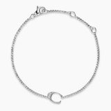 Silver bracelet with a small C initial Charm with Diamond on a white background