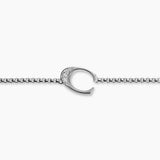 Silver bracelet with a small C initial Charm with Diamond on a white background