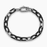 Black and silver chain bracelet on a white background