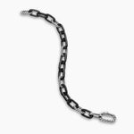 Metallic chain bracelet on a white background
