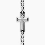Silver Chain Bracelet with a cross in the center of the piece layed out on a white background.