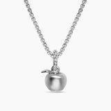 Silver necklace with an apple charm  on a white background