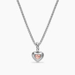 Back of Heart-shaped pendant necklace with pink heart on a white background