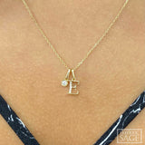 14K Yellow Gold “E” Initial Pendant with Half-Diamond & Polished Finish