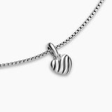 Sterling silver necklace with a small puffy heart charm