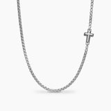 Silver box chain necklace with a cross pendant on a white background