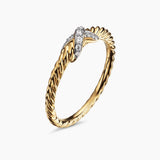Gold cable band ring with a diamond x  in the center 