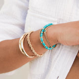 14K GOLD & TURQUOISE RONDELLE BEAD BRACELET WITH 2 PRONG DIAMONDS