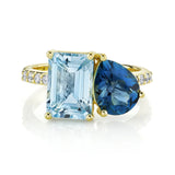 Toi et Moi Pear and Emerald Cut Blue Topaz Ring with Diamond Shank in 18K Yellow Gold